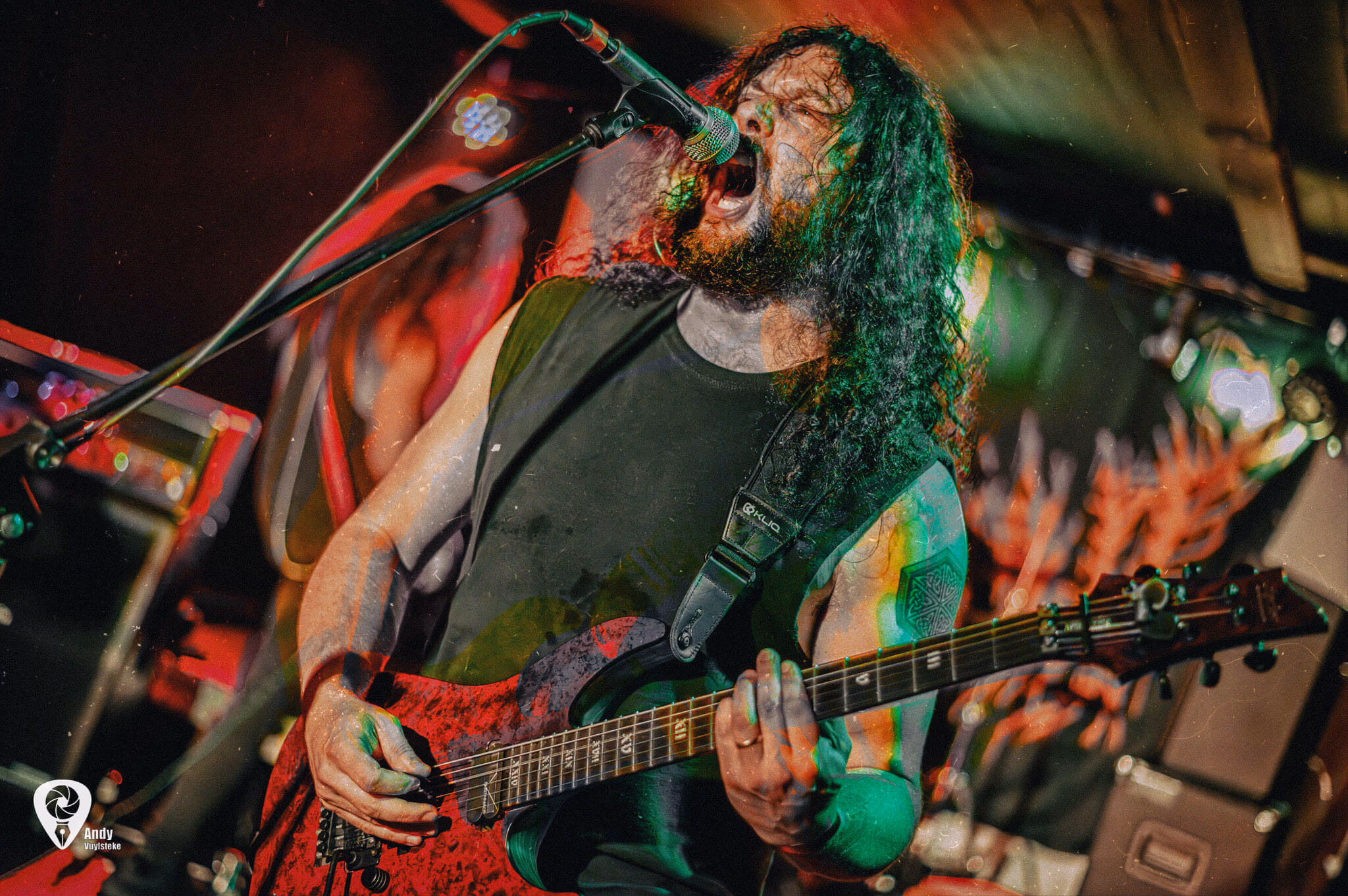 Photo of one of the members in Replicant playing a live show